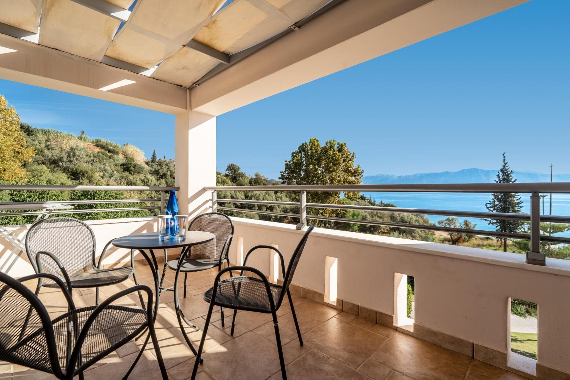 Porto Galini Seaside Resort & Spa Nikiana Exterior foto A balcony in Greece